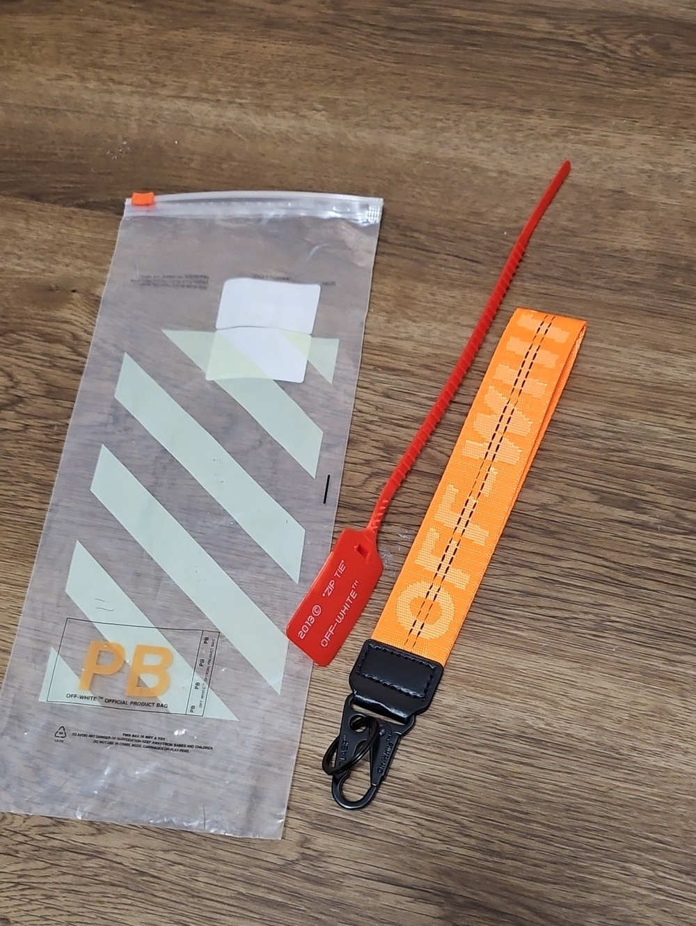 Off-White Orange Woven Logo Key Strap with Black Hardware